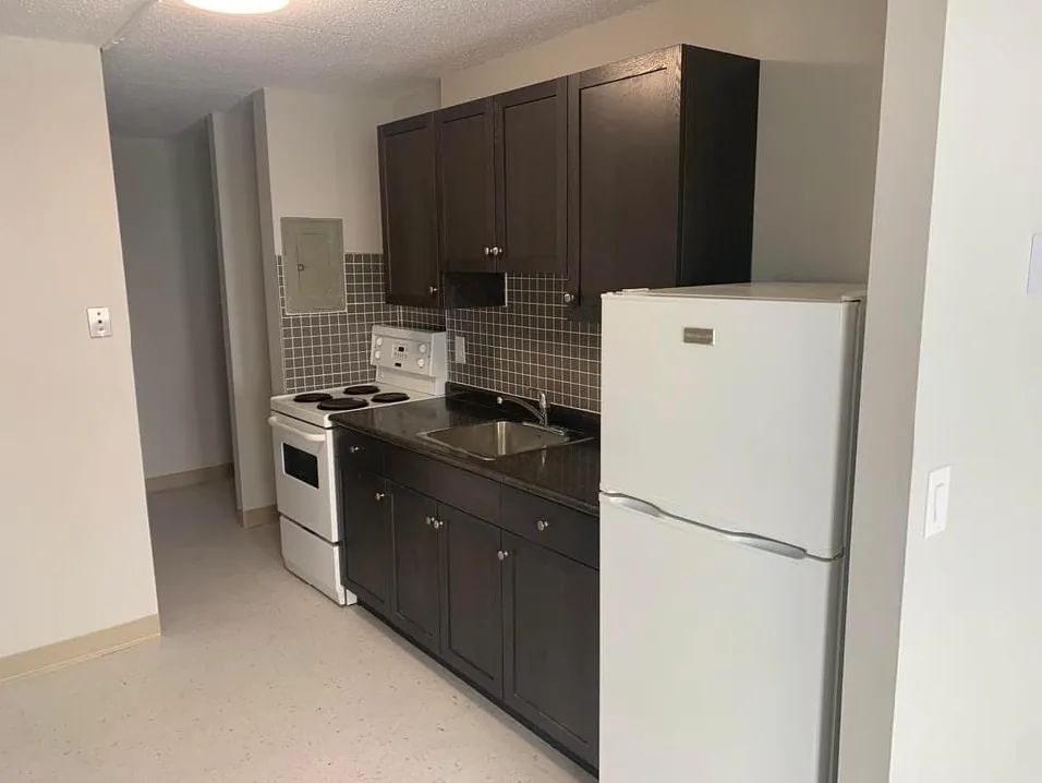 Basement Kitchen & Living Space — Before